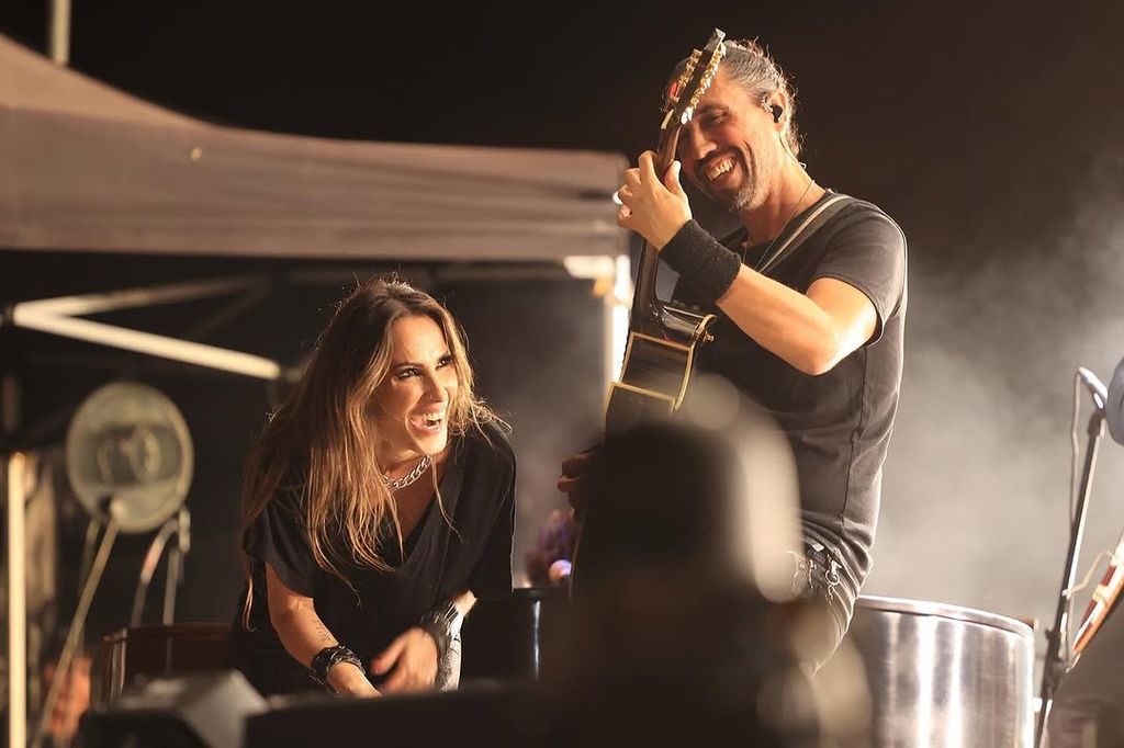 Malú y su hermano José de Lucía en un concierto