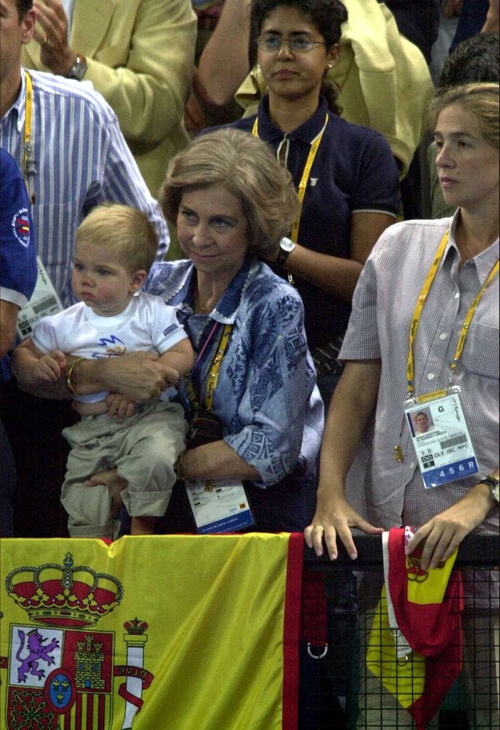 Queen Sofia, with her grandson Juan and her daughter Cristina at the Olympic Games. celebrated that year in Australia