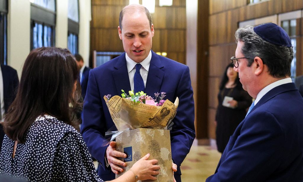 Prince William was presented with flowers for his wife on Feb. 29