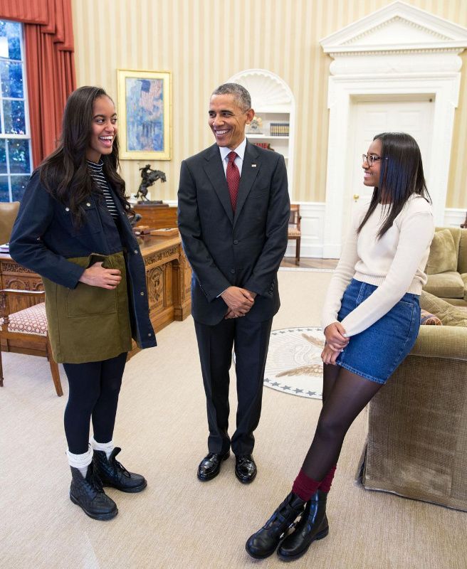 Barack Obama con sus hijas