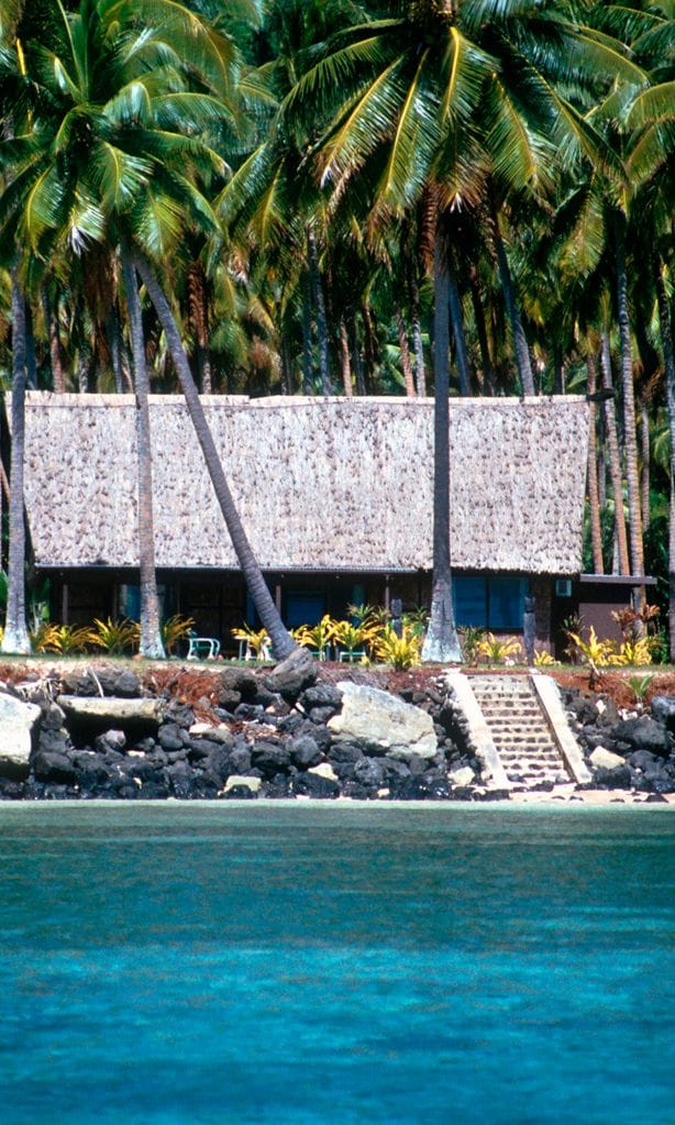 Bungalow in coconut plantation on private island Laucala Fiji now an upscale resort