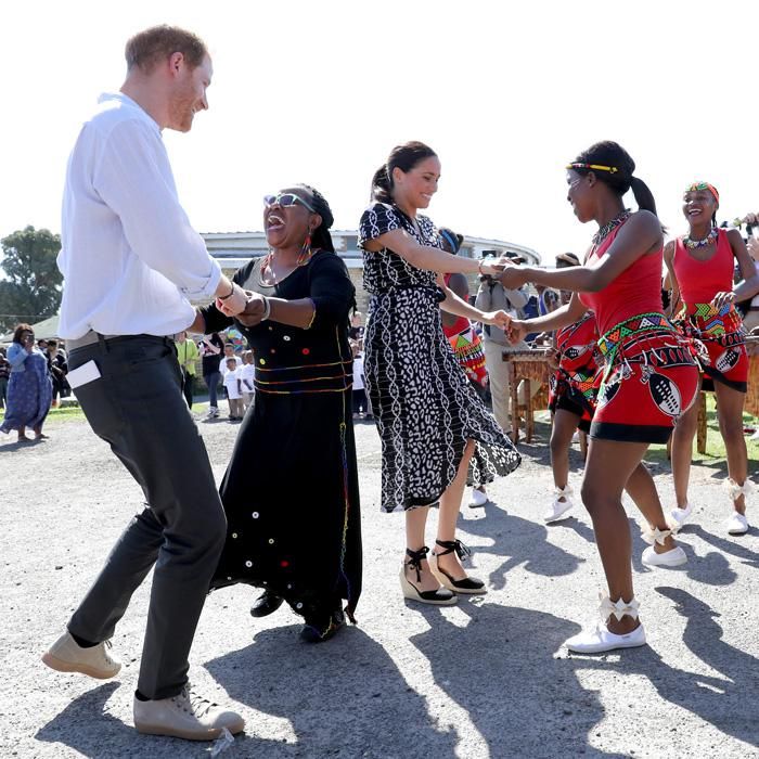 meghan markle prince harry dance africa getty