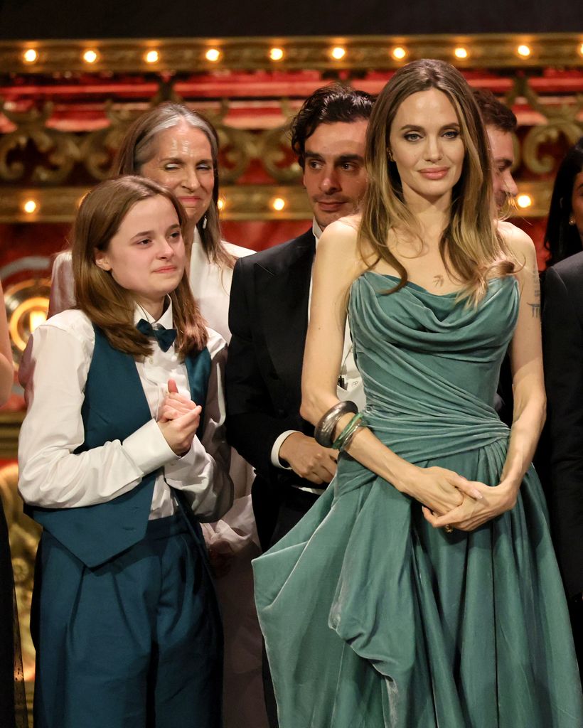 NEW YORK, NEW YORK - JUNE 16: Vivienne Jolie, Angelina Jolie and cast and crew accept the Best Musical award for "The Outsiders" onstage during The 77th Annual Tony Awards at David H. Koch Theater at Lincoln Center on June 16, 2024 in New York City.  (Photo by Theo Wargo/Getty Images for Tony Awards Productions)
