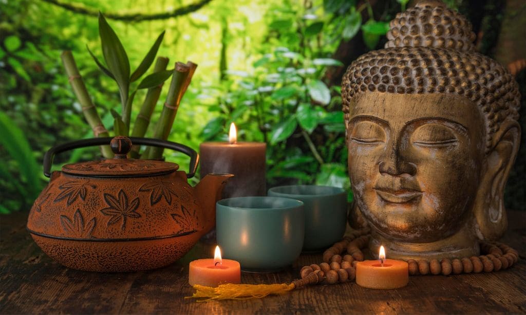 Still life with teapot and Buddhist objects