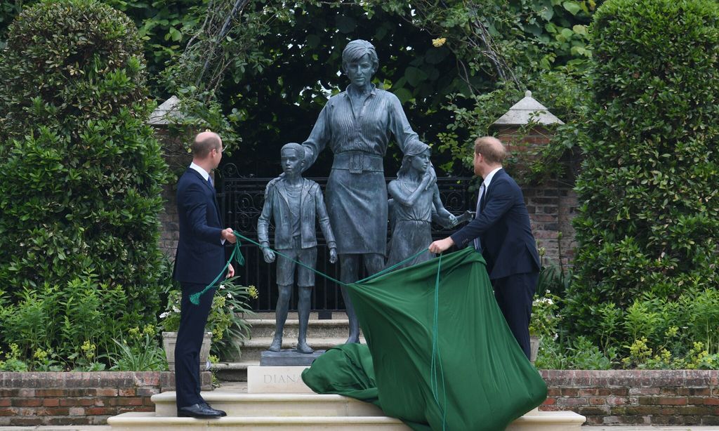 The brothers unveiled a statue of their late mother on July 1