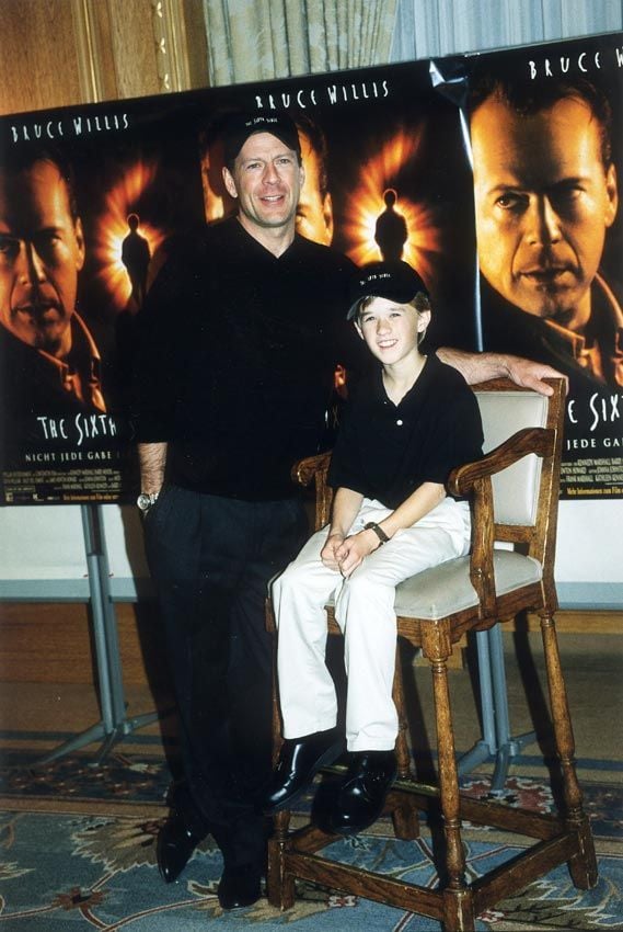 Bruce Willis y Joel Osment en la promoción de El sexto sentido