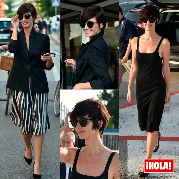 Paz vega con vestido sleek a la rodilla, nada más aterrizar en la ciudad italiana, en color negro, con tirante ancho y escote en 'U'.
