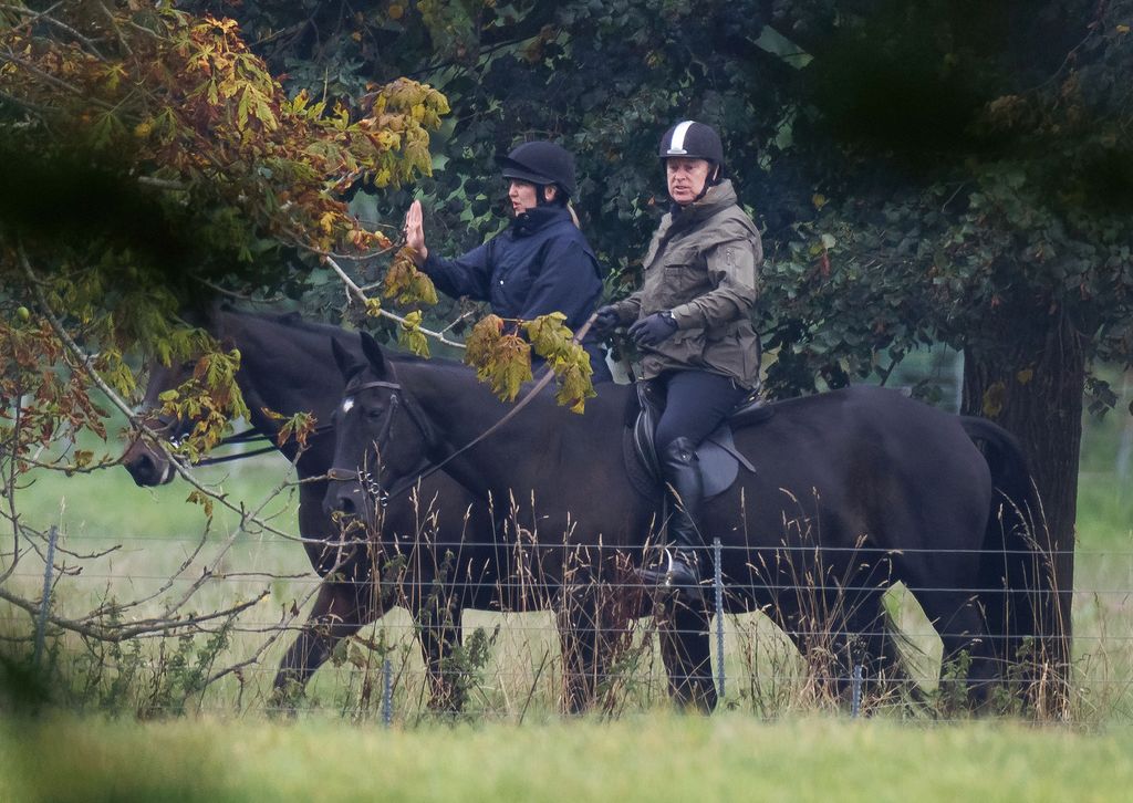 Prince Andrew, Duke of York, is seen horse riding near Windsor Castle in Berkshire