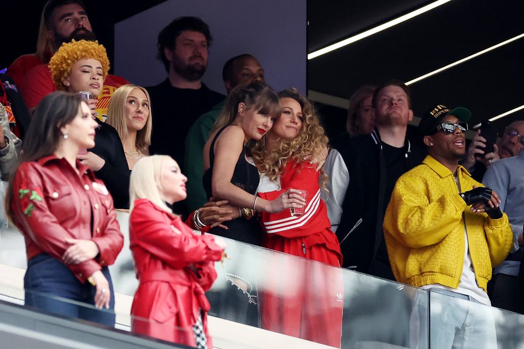 Rapper Ice Spice, Singer Taylor Swift and Actress Blake Lively hug prior to Super Bowl LVIII between the San Francisco 49ers and Kansas City Chiefs at Allegiant Stadium on February 11, 2024 in Las Vegas, Nevada. (Photo by Ezra Shaw/Getty Images)