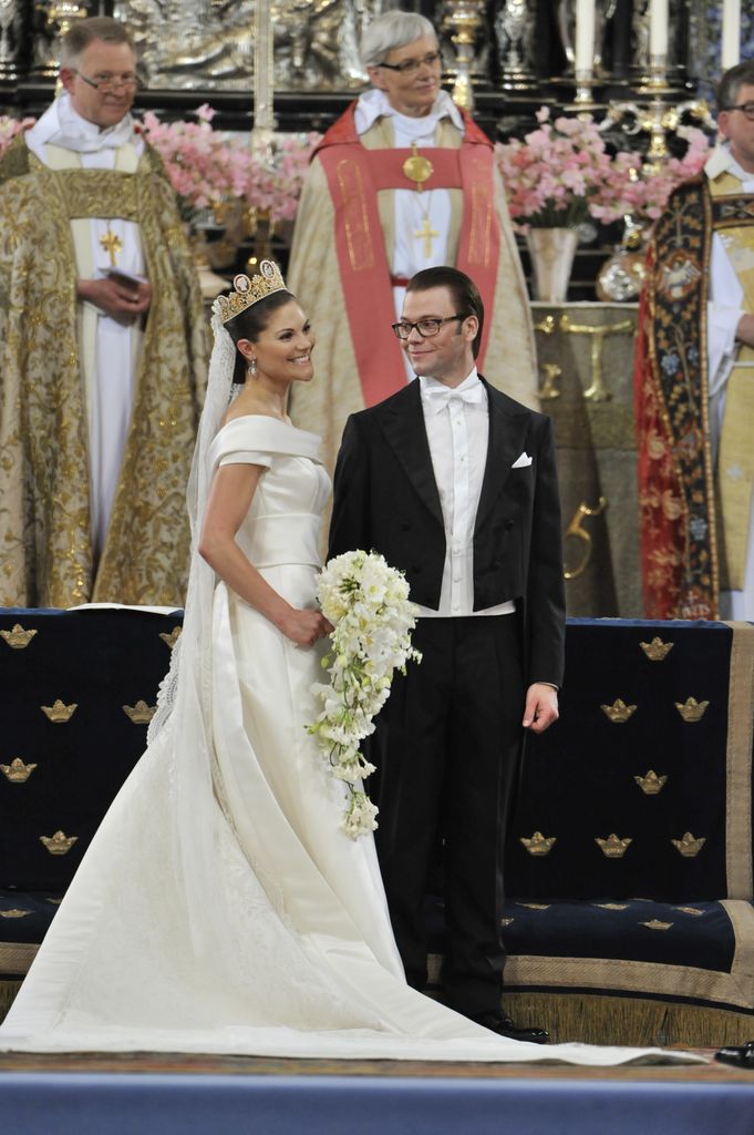 VICTORIA OF SWEDEN WITH HER WEDDING DRESS