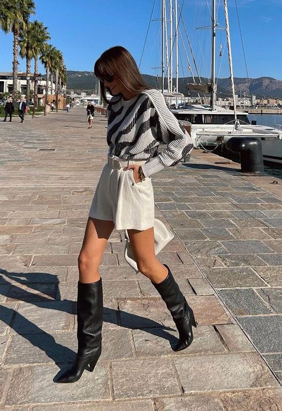 Ropa con botas largas negras sale