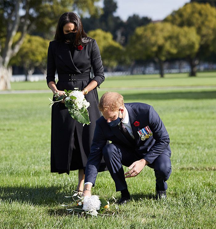 El príncipe Harry y Meghan Markle, en un acto funerario