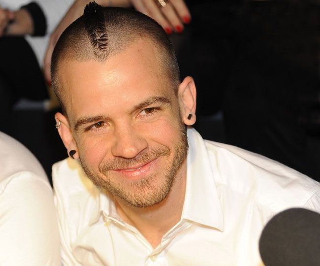 David Muñoz, en el front row del desfile de Davidelfin, durante la recién celebrada 'Fashion Week Madrid Otoño-Invierno 2015-2016'. 