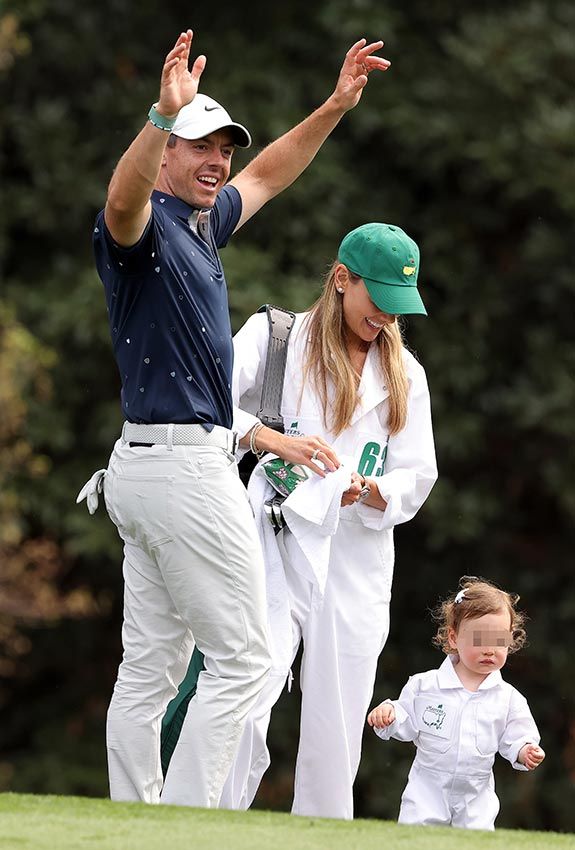 Rory Mcilroy, su mujer Erica Stoll y su hija, Poppy