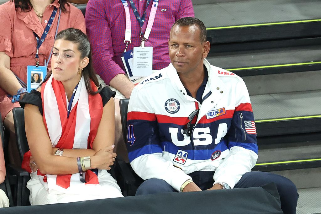 Alex portó con orgullo una chaqueta deportiva del equipo olímpico estadounidense.