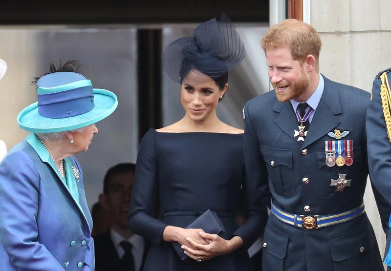 Isabel II con Harry y Meghan