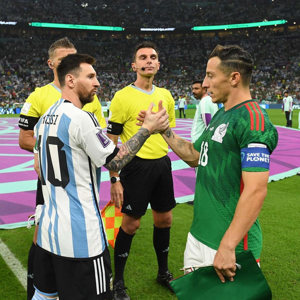 Lionel Messi y Andrés Guardado