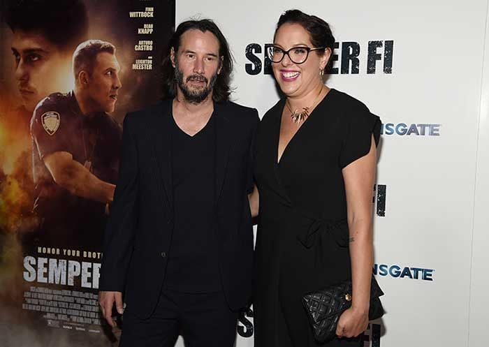 Karina Miller y Keanu Reeves en el estreno de Semper Fi