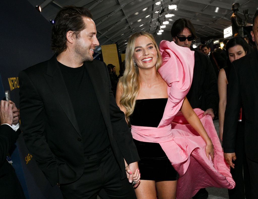 Tom Ackerley y Margot Robbie 