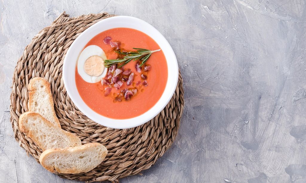 salmorejo soup spanish traditional dish with ham and eggs in a bowl