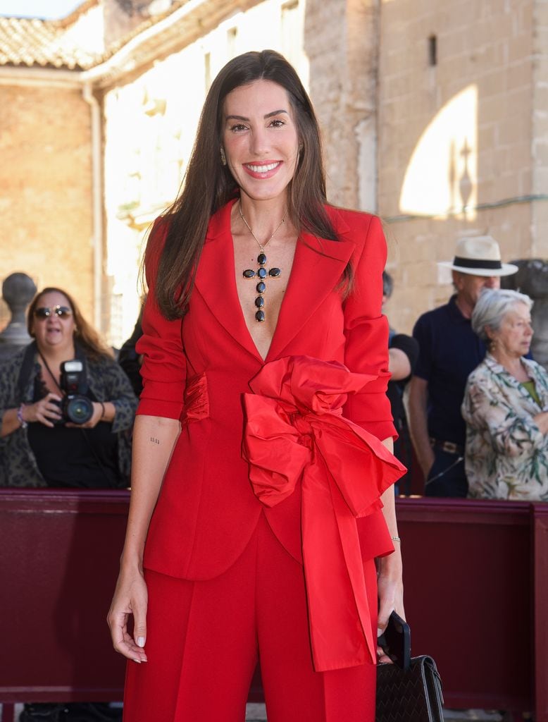 Carla Hinojosa’s red suit at Ana Cristina Portillo’s wedding is the perfect guest look this fall