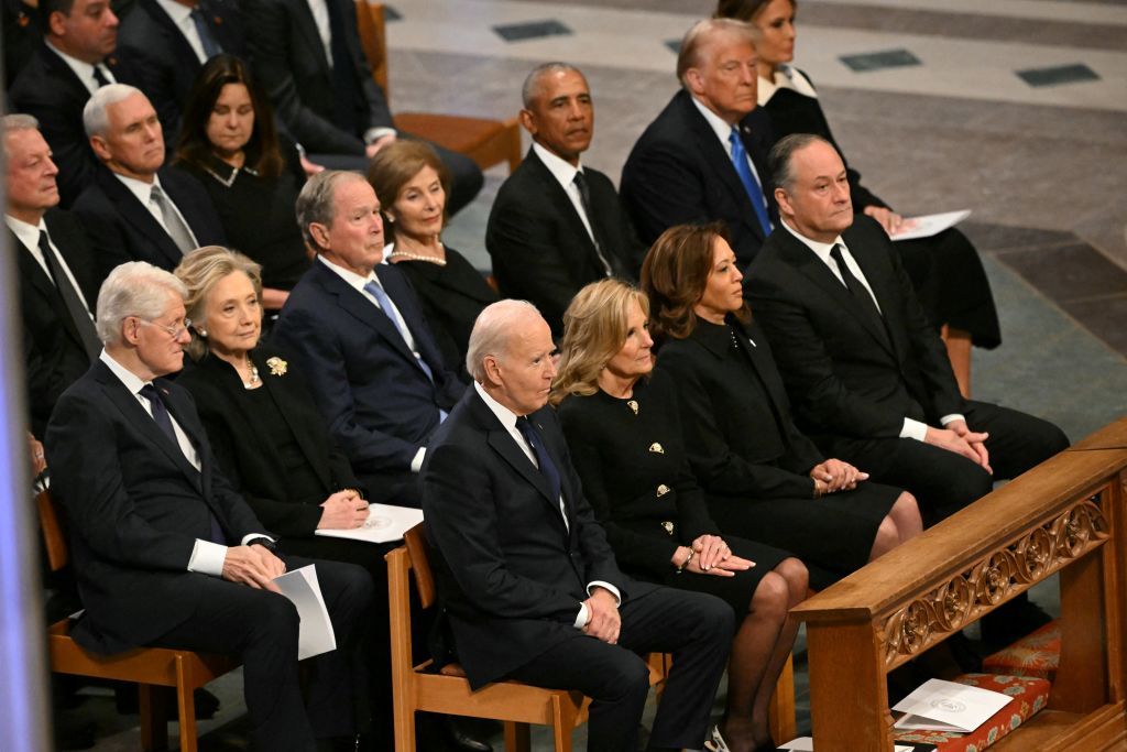 TOPSHOT - From L to R, front row, US President Joe Biden, First Lady Lady Jill Biden, Vice President Kamla Harris, Second Gentleman Doug Emhoff, second row, former President Bill Clinton, former Secretary of State Hillary Clinton, former President George W. Bush, his wife Laura Bush, former President Barack Obama, President-elect Donald Trump and his wife Melania Trump attend the State Funeral Service for former US President Jimmy Carter at the Washington National Cathedral in Washington, DC, on January 9, 2025. (Photo by Mandel NGAN / AFP) (Photo by MANDEL NGAN/AFP via Getty Images)