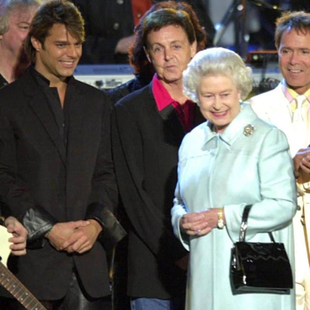 Reina Isabel y Ricky Martin