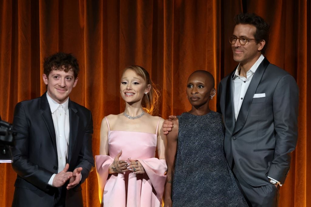 Ethan Slater, Ariana Grande, and Cynthia Erivo accept the Best Film Award for "Wicked" from Ryan Reynolds onstage during The National Board of Review Annual Awards Gala at Cipriani 42nd Street on January 07, 2025 in New York City