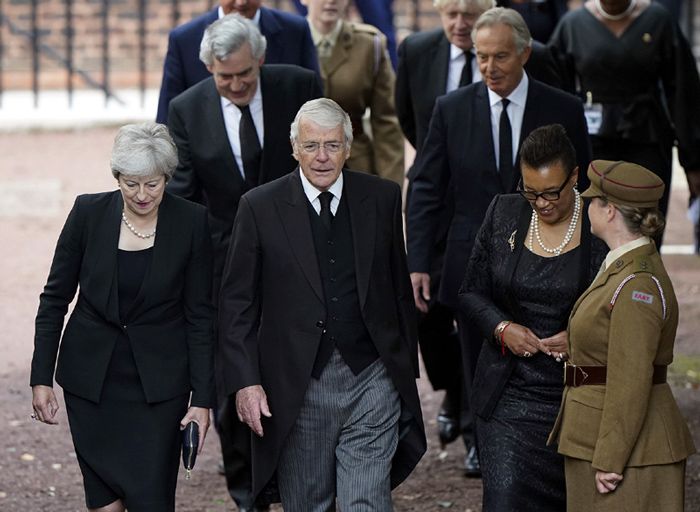 Theresa May y John Major