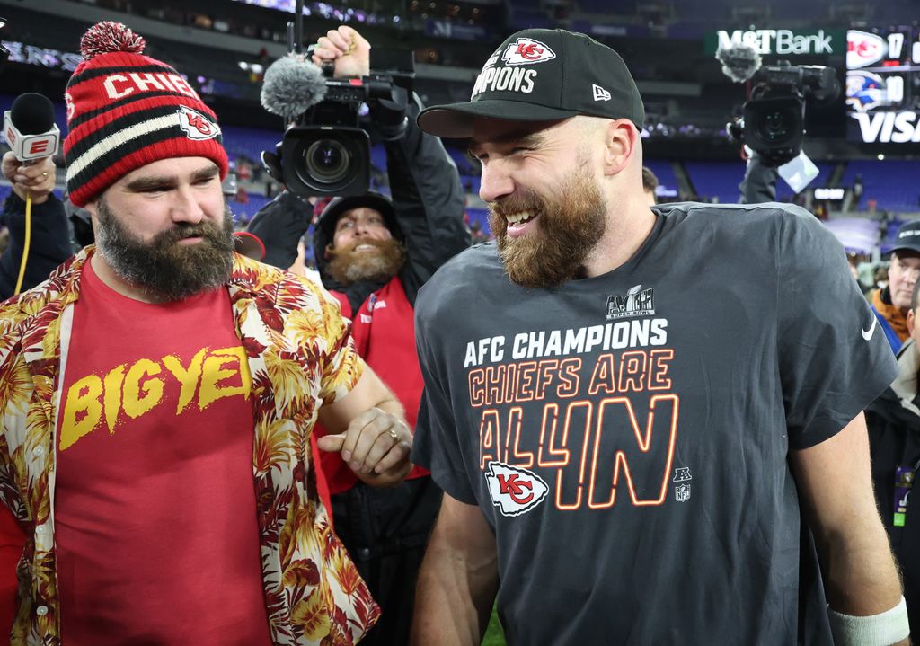 BALTIMORE, MARYLAND - JANUARY 28: Travis Kelce #87 of the Kansas City Chiefs celebrates with his brother Jason Kelce after a 17-10 victory against the Baltimore Ravens in the AFC Championship Game at M&T Bank Stadium on January 28, 2024 in Baltimore, Maryland. (Photo by Rob Carr/Getty Images)