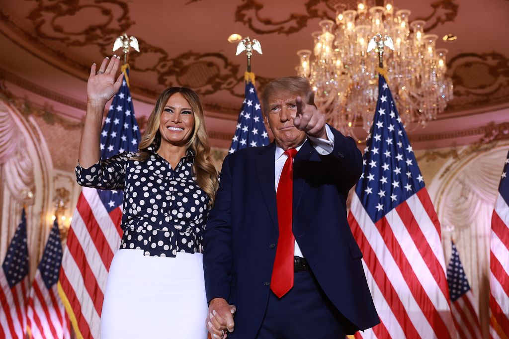 PALM BEACH, FLORIDA - NOVEMBER 15: Former U.S. President Donald Trump and former first lady Melania Trump stand together during an event at his Mar-a-Lago home on November 15, 2022 in Palm Beach, Florida. Trump announced that he was seeking another term in office and officially launched his 2024 presidential campaign.  (Photo by Joe Raedle/Getty Images)