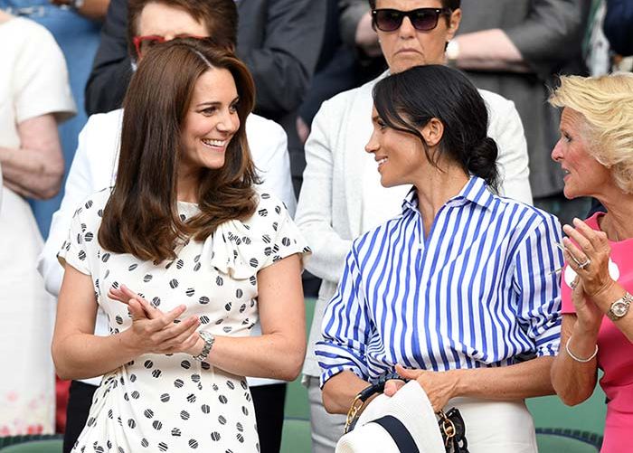 Meghan Markle y Kate Middleton en un partido de tenis en Wimbledon en 2018