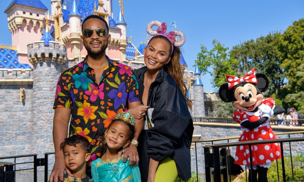 Chrissy Teigen And John Legend Visit Disneyland Resort in Anaheim, California