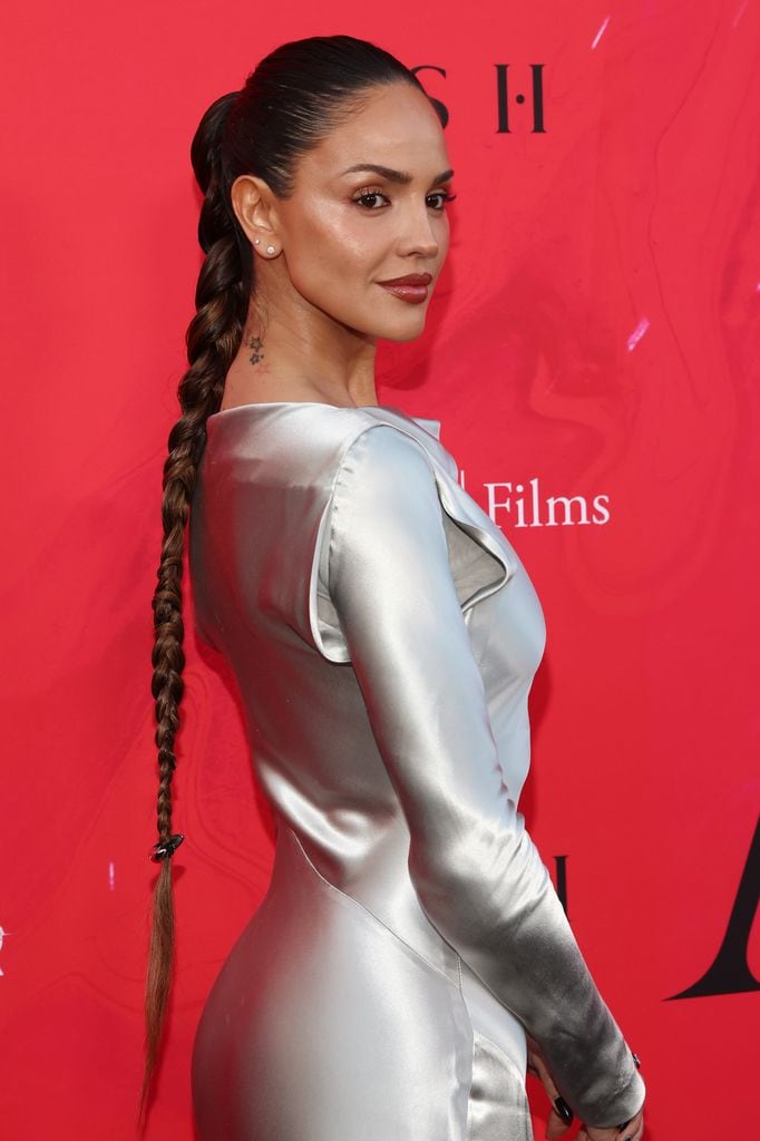 Eiza González presumed a long polished braid and a bright makeup