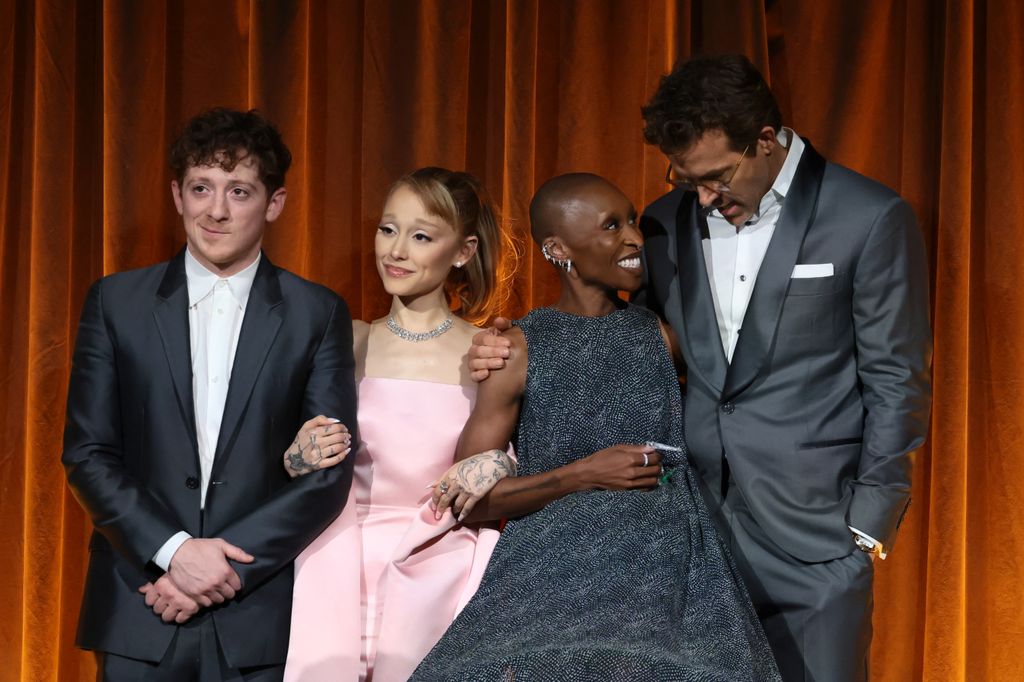 Ethan Slater, Ariana Grande, and Cynthia Erivo accept the Best Film Award for "Wicked" from Ryan Reynolds onstage during The National Board of Review Annual Awards Gala at Cipriani 42nd Street on January 07, 2025 in New York City