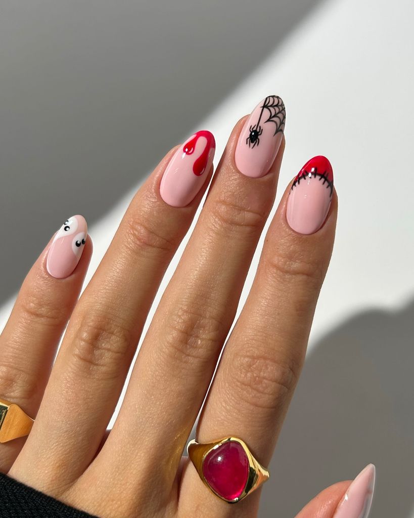 Manicura de Halloween con arañas, fantasmas y sangre