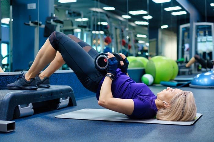 mujer en el gimnasio