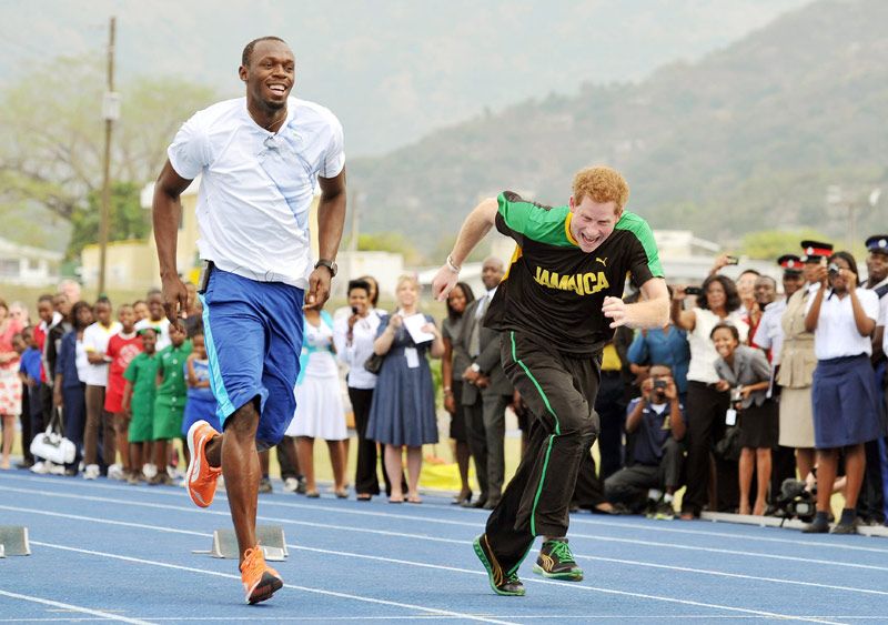 El príncipe Harry con Usain Bolt