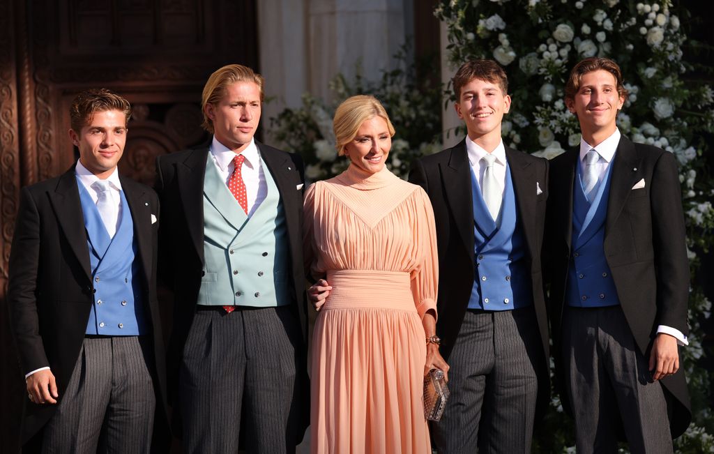 Marie-Chantal of Greece with her sons at the wedding of Theodora of Greece