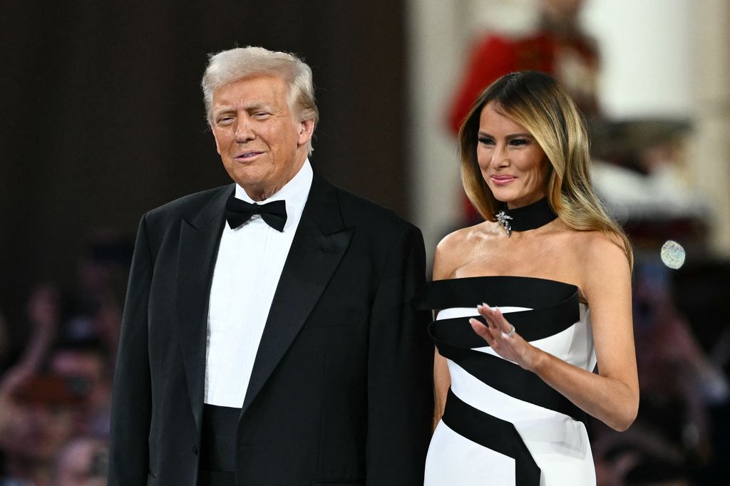 US President Donald Trump (L) and First Lady Melania Trump arrive at the Commander-In-Chief inaugural ball at the Walter E. Washington Convention Center in Washington, DC, on January 20, 2025. (Photo by Patrick T. Fallon / AFP) (Photo by PATRICK T. FALLON/AFP via Getty Images)