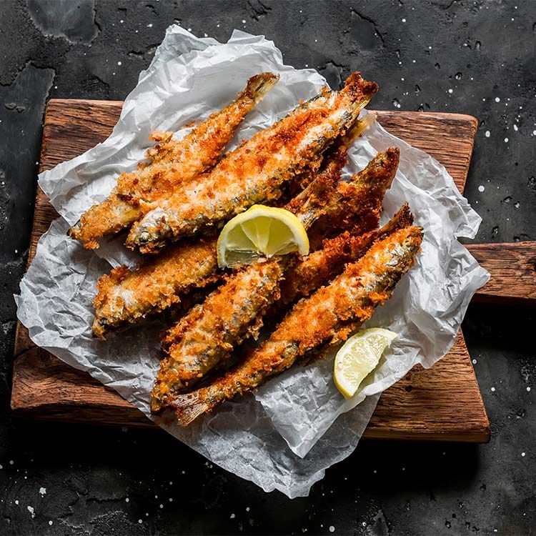 Sardinas empanadas al pimentón