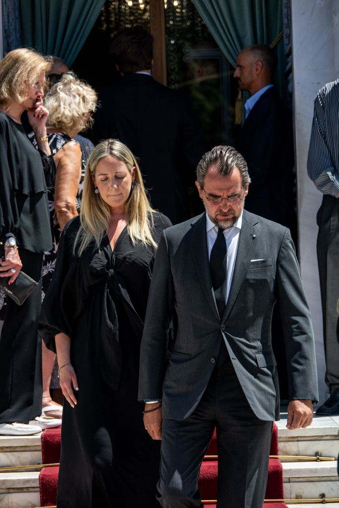 Nicolás y Theodora de Grecia en el funeral de Miguel de Grecia el 1 de agosto de 2024