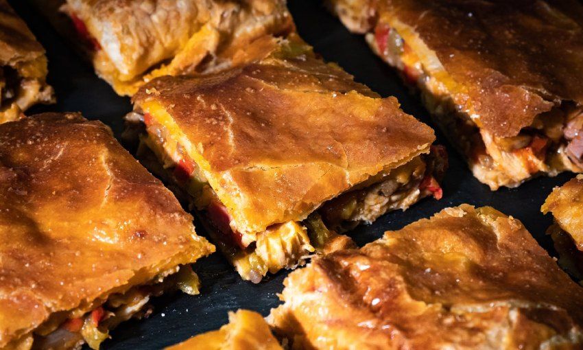 Empanada gallega, una de las delicias gatronómicas más buscadas en restaurantes y tiendas.