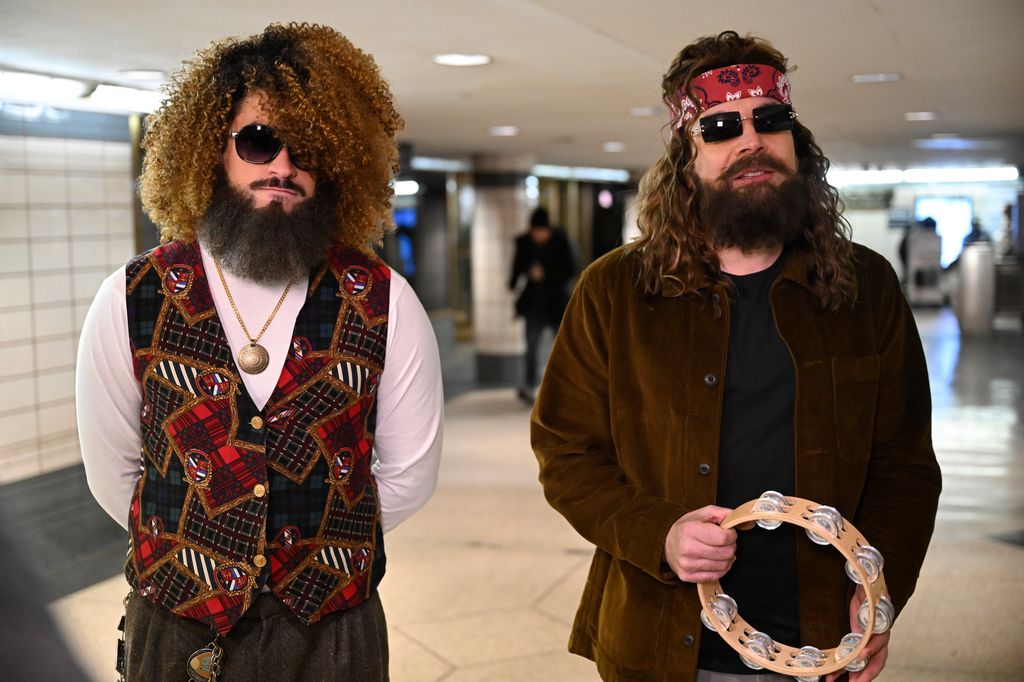 THE TONIGHT SHOW STARRING JIMMY FALLON -- Episode 2077 -- Pictured: (l-r) Rapper & singer Bad Bunny and host Jimmy Fallon during "Subway Busking" on Monday, January 13, 2025 -- (Photo by: Todd Owyoung/NBC via Getty Images)