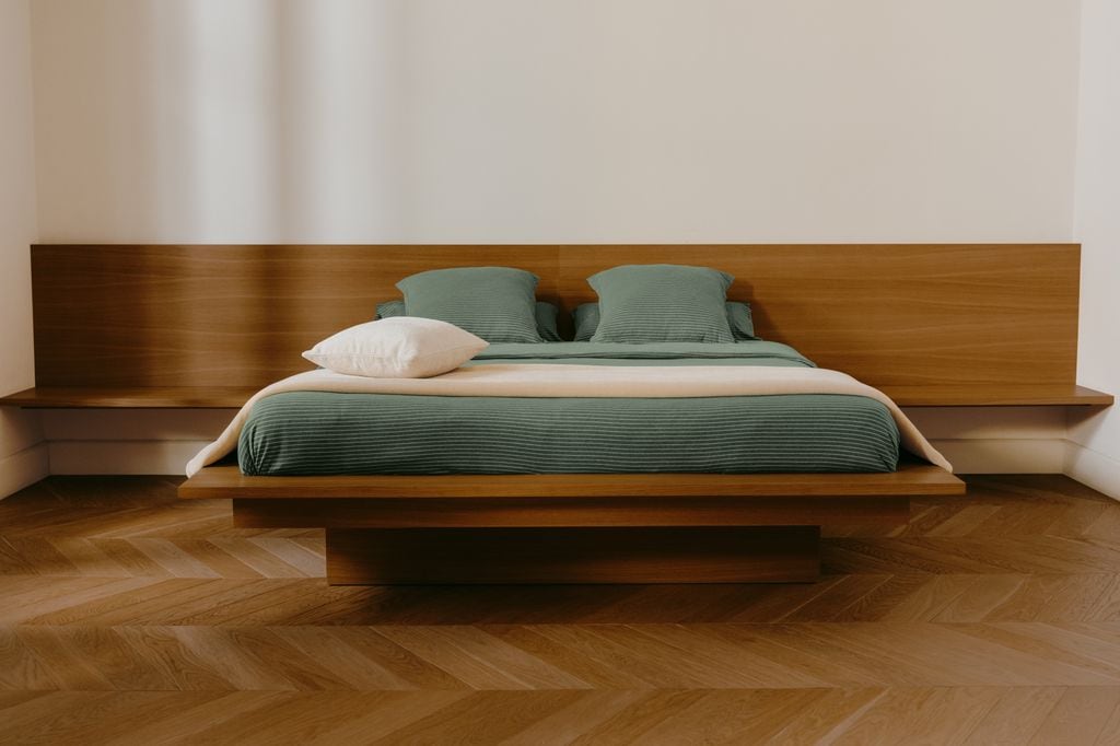 Bedroom with green bedding