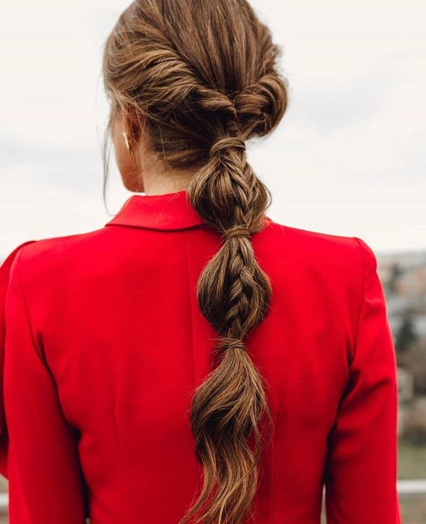 Peinados de invitada con trenzas pelo largo