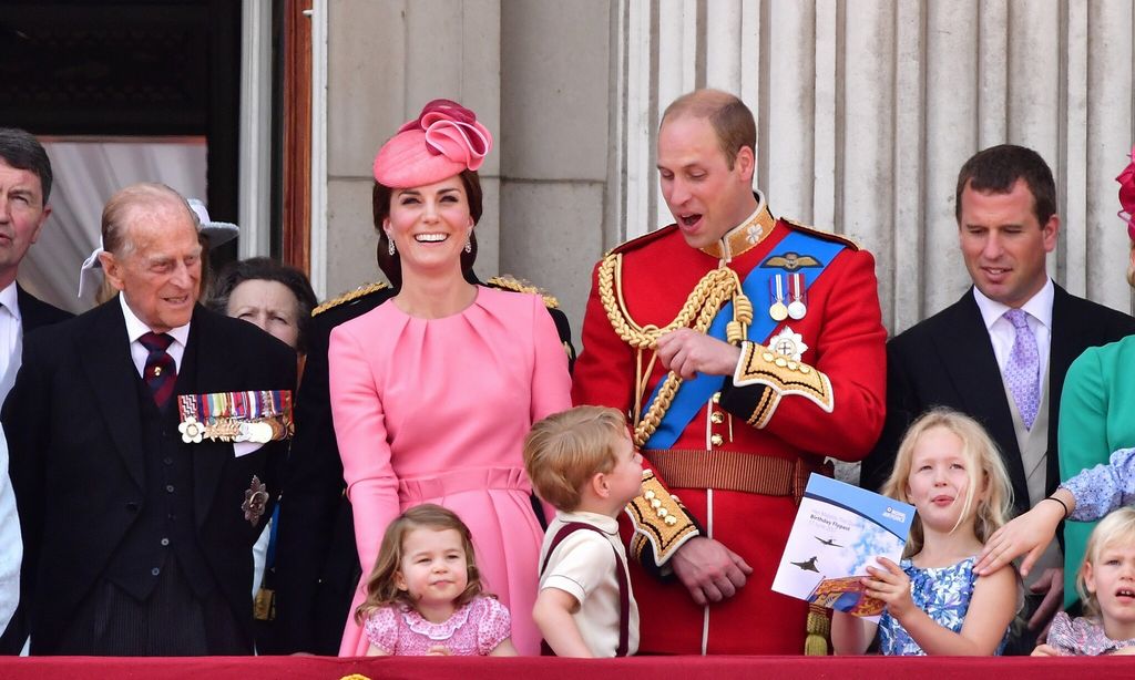 the queen 39 s husband look on at his great grandchildren princess charlotte prince george savannah phillips and isla phillips during trooping the colour in 2017