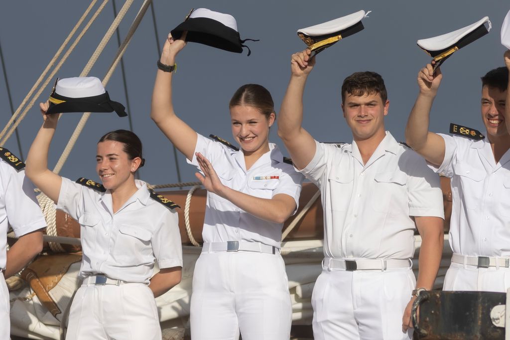 Crown Princess Leonor of Spain (C) stands with fellow crew members as they leave at Las Palmas de Gran Canaria port on January 23, 2025 in Las Palmas de Gran Canaria, Spain. Princess Leonor will take part in a training cruise as part of her military education, sailing on "Juan sebastian de Elcano" ship, alongside 76 midshipmen and visiting eight countries on a six-month journey covering over 17,000 nautical miles. (Photo by RubÃ©n GrimÃ³n/Getty Images)