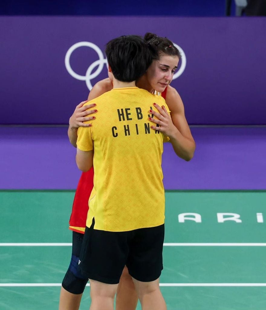 Carolina Marin junto a He Bingjiao