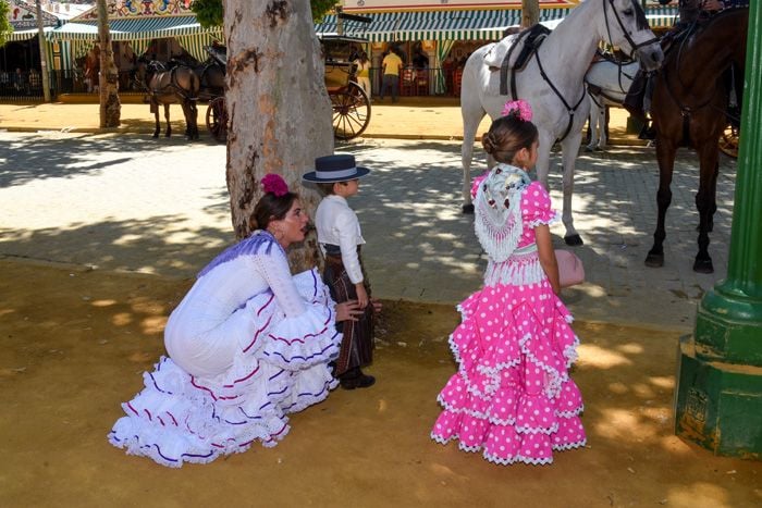 Lourdes Montes con sus hijos en la feria